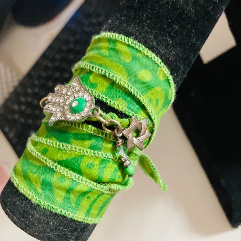 Silk wrap bracelet with hamsa and charms
